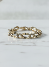 Bracciale a maglia nei tre colori dell'oro