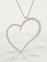 Pendente cuore contorno in oro bianco e diamanti ct. 0,87 gr.10,7