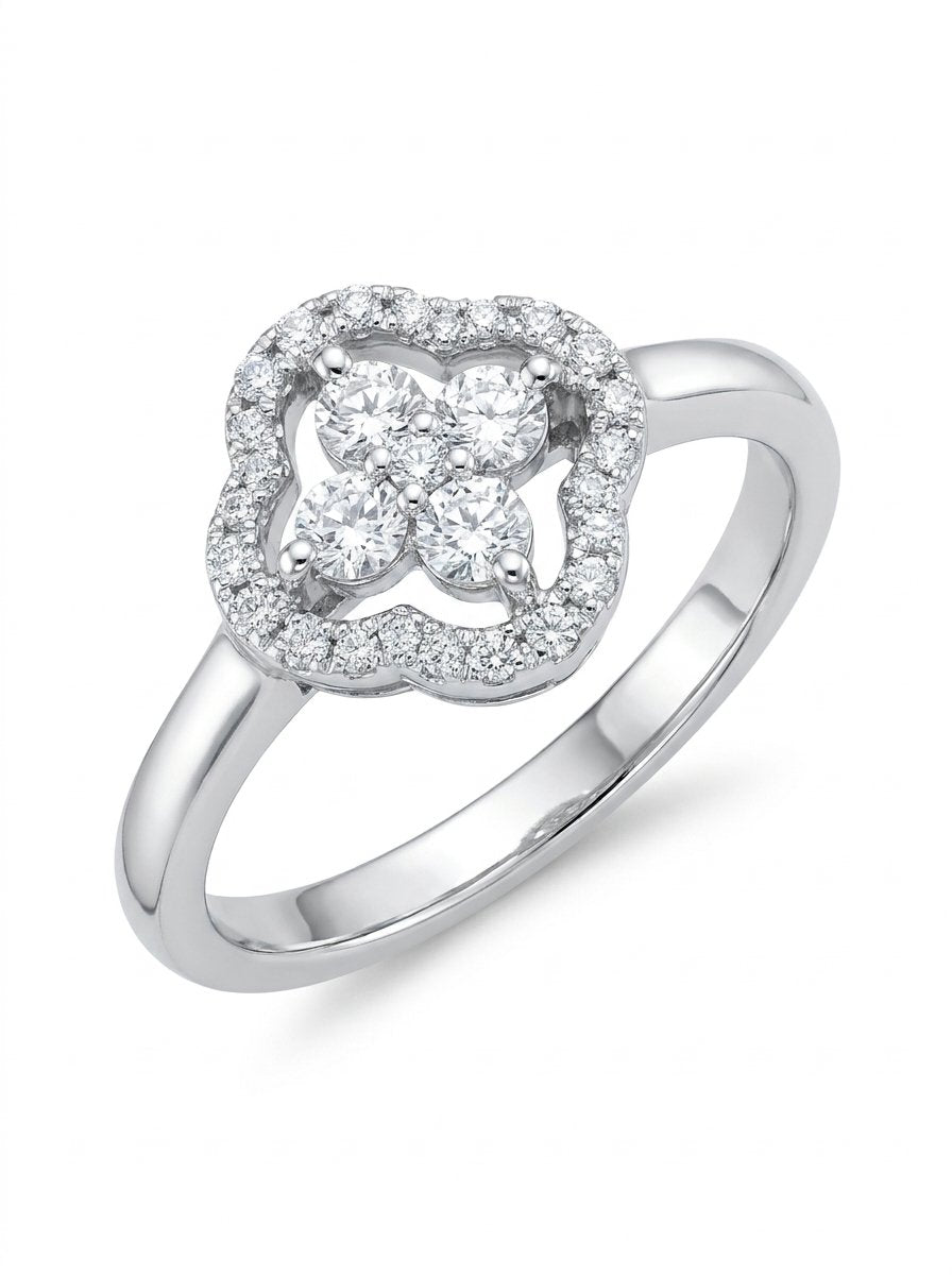 Anello fantasia in oro bianco e diamanti con fiore stilizzato al centro e pavè di contorno diamanti ct.0,35 F-VS gr. 3,8
