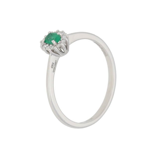 Anello contorno classico con smeraldo ovale e diamanti