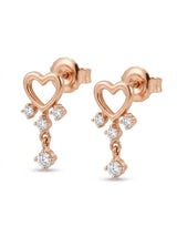 Orecchini in oro rosa a  cuore con 4 diamanti pendenti ct. 0,16 G-SI au gr.1,8