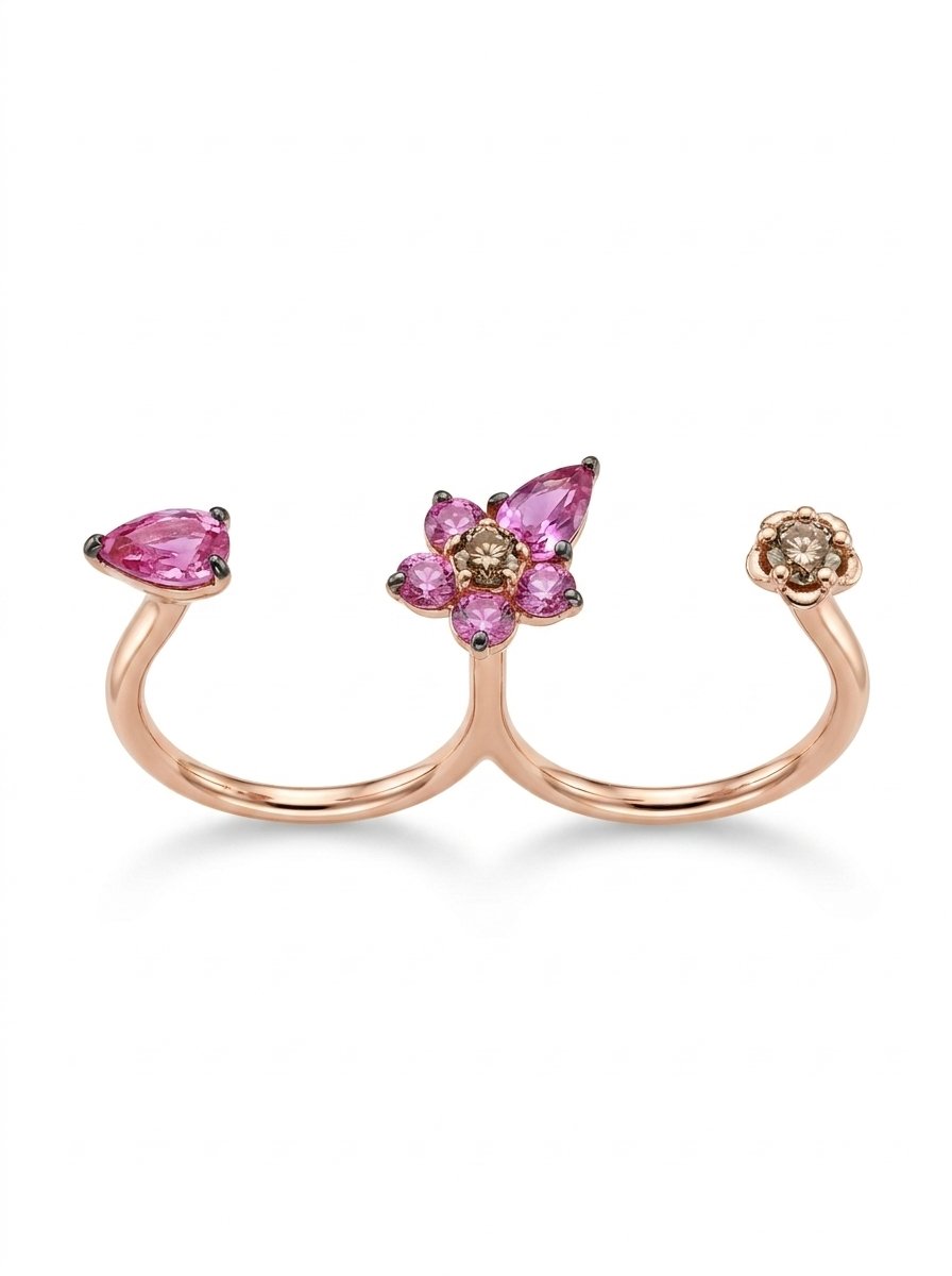 Anello due dita oro rosa con diamanti brown taglio brillante ct  0,31 zaffiri rosa taglio goccia ct 0,95 e zaffiri taglio brillante rotondo ct 0,46 montati su griffe brunite oro gr.4,7