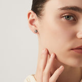 Orecchini mini margherite e zircone
