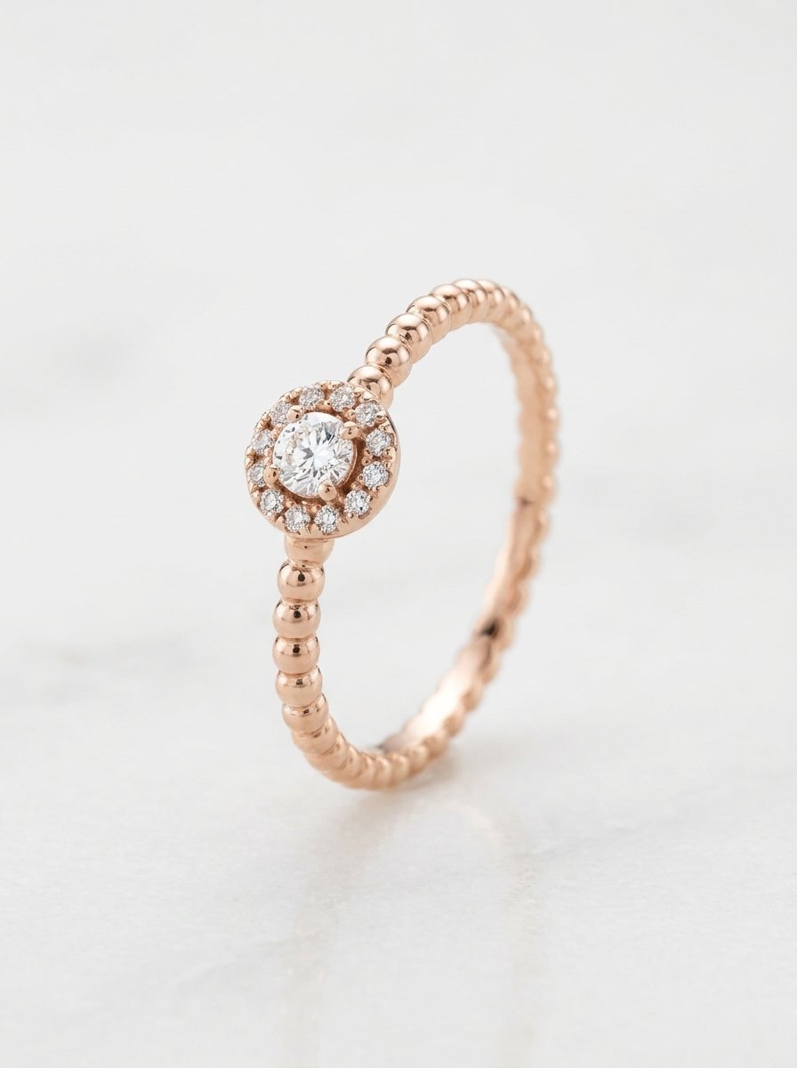 Anello solitario con contorno in oro rosa e diamanti bianchi ct. 0,09 F-SI au gr. 1,3