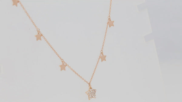 Girocollo multi pendente a stella in oro rosa  con diamanti