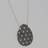 PENDENTE A GOCCIA PAVè DI DIAMANTI NERI CT.6,04 E BIANCHI CT.0,73