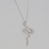 Pendente in oro bianco serpente con diamanti ct. 0,20