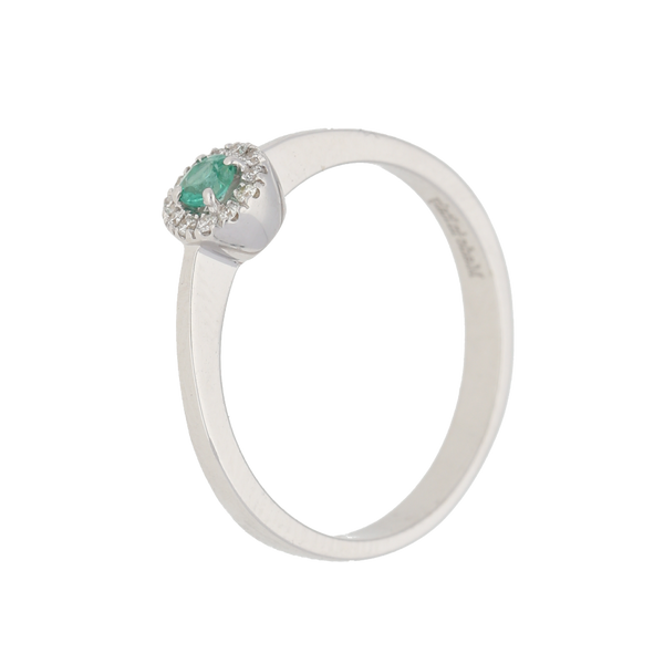 Anello contorno classico con smeraldo e diamanti