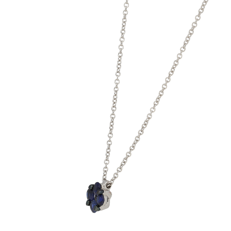 Pendente a forma di fiore con zaffiri blu ct. 0,38 e diamante ct.0,02