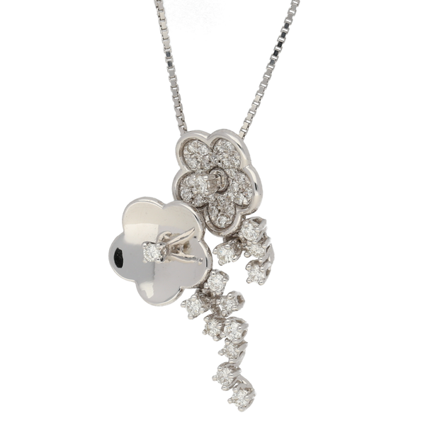 Pendente fiori fantasia in oro bianco e diamanti ct. 0,56