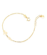 Bracciale in oro giallo con ancora e barchetta con smalto colorato
